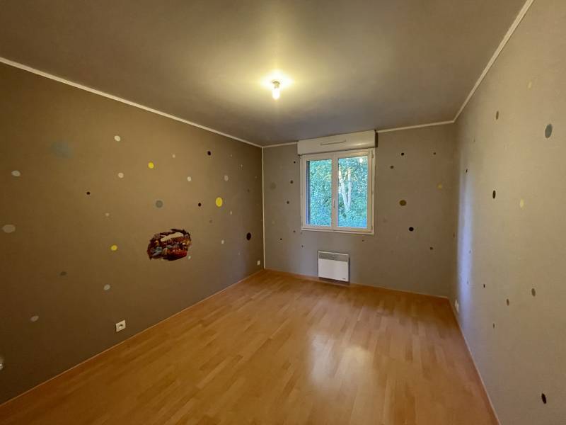 MAISON DE TYPE F4 AVEC GARAGE ET JARDIN A SAINT MICHEL